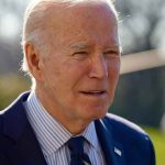 Did Biden FBI Buried Pipe Bomb Leads? Elderly man in suit outside in daylight.