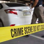 Surveillance Captured Teen’s Last Known Moments Crime scene tape blocking off white sedan.