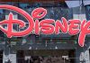 Privacy Panic: Disney’s AR Glasses Controversy Bright red Disney logo displayed on a storefront window
