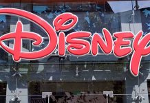 Privacy Panic: Disney’s AR Glasses Controversy Bright red Disney logo displayed on a storefront window