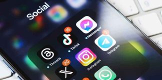 Smartphone showing social media app icons in a folder.