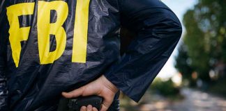 Protesters Storm FBI Cars! FBI agent holding a gun behind the back.