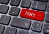 Journalism Branded as Hate Crime Close-up of a keyboard with a red key labeled Hate