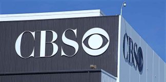 Exterior view of a CBS media building featuring the CBS logo