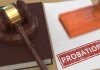 A gavel and a stamped document marked 'PROBATION'