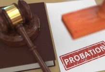 A gavel and a stamped document marked 'PROBATION'