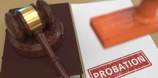 A gavel and a stamped document marked 'PROBATION'