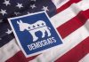 Democrats CRACK Down On Election Betting Democratic Party symbol on American flag background.