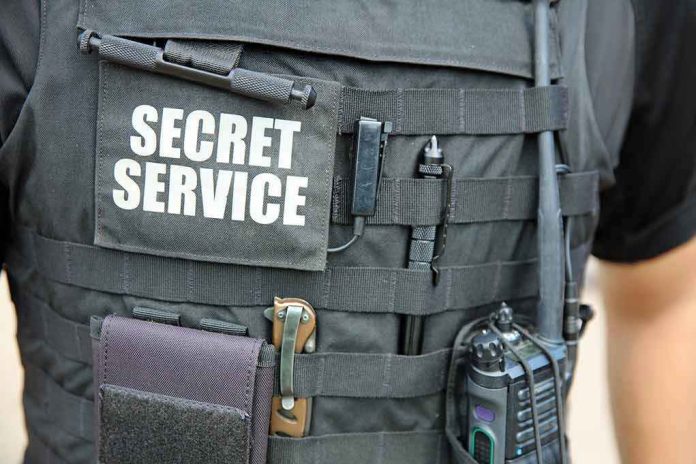 1520321309 Secret Service vest with various tactical gear attached.