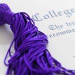 SEGREGATED Graduations Spark Outrage Across California Close-up of a purple graduation tassel next to a diploma
