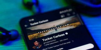 Tucker Carlson CIA Accusation: NO EVIDENCE! Smartphone displaying a YouTube channel profile page.