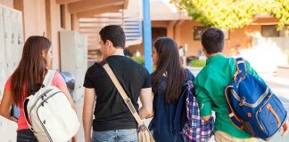 Teen’s Ghost Gun Factory Shocks San Diego Group of students walking together in a school corridor
