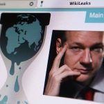 WikiLeaks website interface featuring a globe and a portrait of a man