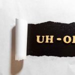 Jury BLUNDER Explodes High-Profile MURDER Verdicts! Torn paper revealing UH-OH text underneath.