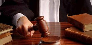High Court BRUTALLY SLAPS DA — It’s About TIME! Judges gavel on desk with books.