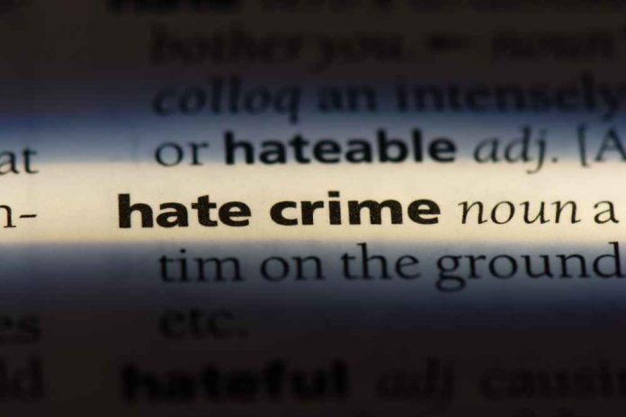 shutterstock_1148782202 Close-up of a dictionary page showing the definition of 'hate crime'
