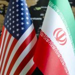 Trump’s ‘Never’ Claim Meets EXPIRING CLOCKS Flags of the United States and Iran displayed together