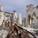 Holy Shrine DESTROYED –Historical TREASURE LOST! Interior view of a destroyed building with collapsed arches and debris