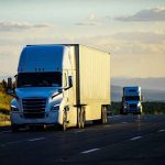 TRUCKERS Win BIG — EPA’s Billion-Dollar Twist! Two semitrucks driving on a highway