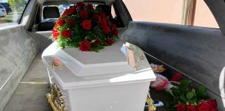 HOLLYWOOD Icon Gone — Questions EXPLODE White coffin with red roses inside a hearse.