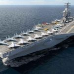 Arabian Sea MYSTERY — Navy Flier VANISHES Aircraft carrier sailing at sea with jets lined up on the flight deck