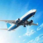 Passenger ‘Nearly Sucked Out’ — TERRIFYING DETAILS ! An airplane flying against a clear blue sky with clouds