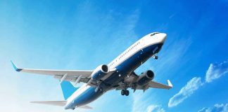 Passenger ‘Nearly Sucked Out’ — TERRIFYING DETAILS ! An airplane flying against a clear blue sky with clouds