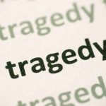 U.S. Island SMASHED — Then SILENCE Close-up of the word 'tragedy' printed multiple times in varying shades