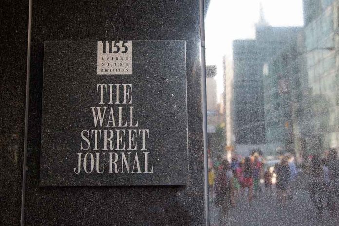 shutterstock_1301601253 The Wall Street Journal plaque on a building exterior
