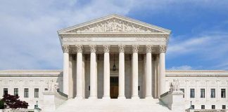 SHOCKING DECISION — Supreme Court Hands POTUS the WATCHDOGS Front view of the Supreme Court building with large columns and steps under a blue sky