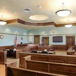 Chilling Court TWIST — Teen Drops 55 SHOCKING BOMBS Empty courtroom with wooden benches and judge's bench
