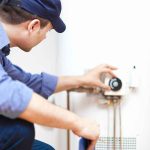 CHILLING — Home Repair Ends In BLOOD Plumber adjusting the settings on a water heater
