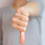 Identity BRAWL Explodes On-Air — Congresswoman TARGETS JEWISH VOTERS hand showing a thumbs down gesture