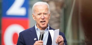 Bombshell MEMO — Biden’s LAST MINUTE Shield Elderly man speaking into a microphone at an outdoor event