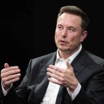 Musk’s DROPS BOMBSHELL — WHO He REALLY Supports! man in a suit speaking with hand gestures
