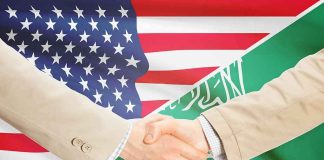 TRUMP’S Nuclear Deal — FULL IMPACT HERE… Handshake between two people over U.S. and Saudi flags