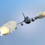 Missile Barrage FOILED — US Jets HIT BACK fighter jet firing two missiles in flight