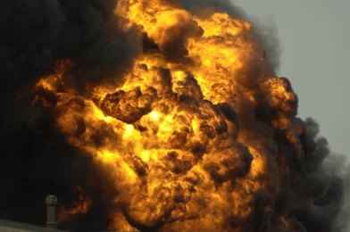 shutterstock_456020-1 Fireball explosion with thick black smoke
