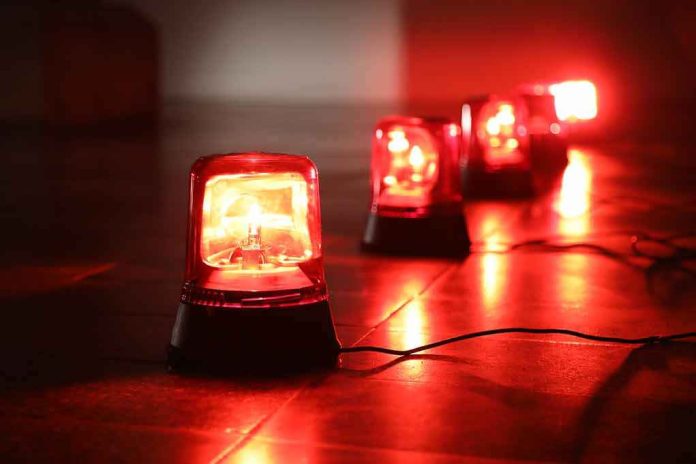 shutterstock_1042134532 Red emergency beacons on a floor