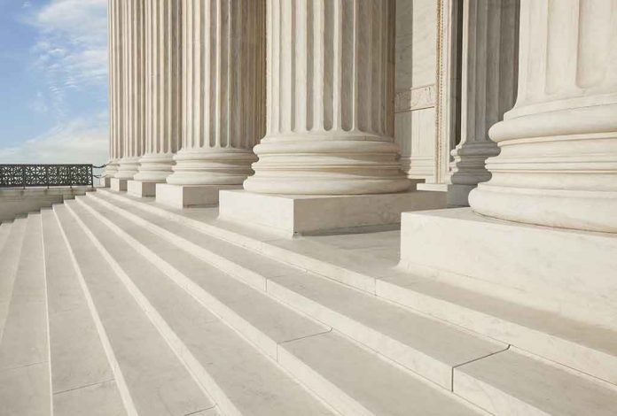 shutterstock_111340829 Marble columns and steps of a neoclassical building
