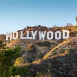 HORRIFIC Hollywood TRIPLE KILLING Just EXPOSED Hollywood Sign on a sunlit hillside