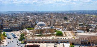 Sharia Panic EXPLODES — Texas Council Drops BOMB historic mosque with domes and minaret overlooking a busy city square