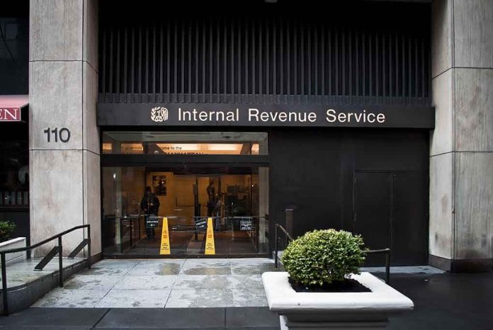 shutterstock_131832332 Entrance of the Internal Revenue Service office with signage