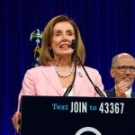 Pelosi Flip-Flops — Why THIS is a NEW ONE woman in pink blazer speaking at a podium