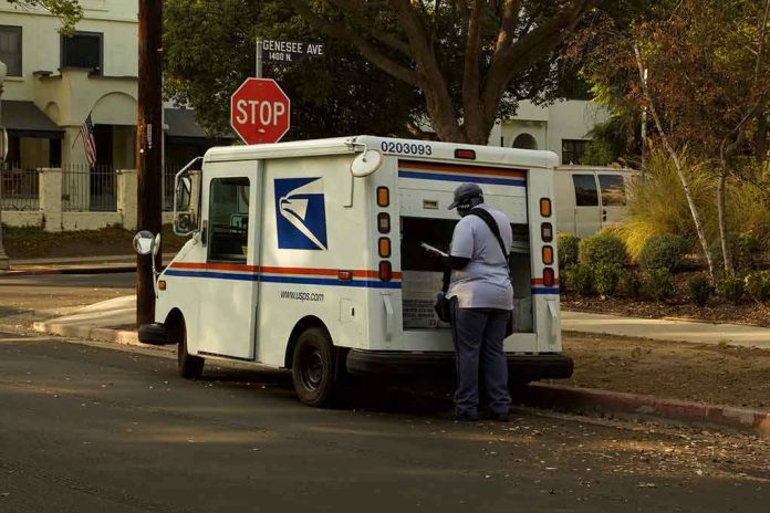 Mail carrier standing behind a USPS truck on a suburban street