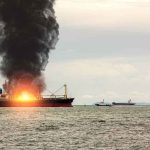PACKED SHIP IGNITES! — Dozens VANISH! Cargo ship on fire with thick black smoke at sea