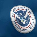 U.S. Department of Homeland Security seal on blue fabric