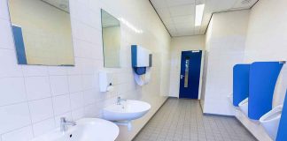 Public restroom with sinks and urinals
