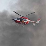 Helicopter Down — Wildfire EXPLODES Rescue helicopter hovers amid thick smoke