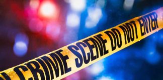 Teen Party Shooting Suspects CAUGHT — Sheriff Says Families KNEW yellow crime scene tape with blurred police lights